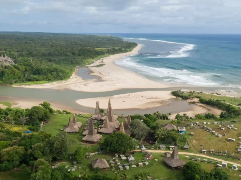 Aerial view of Ratenggaro beach and river mouth, Southwest Sumba
