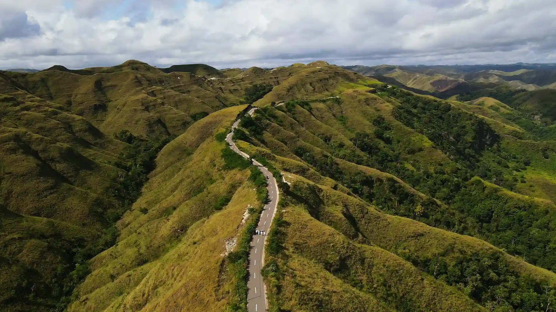 Winding road across the Tanarara Hills, East Sumba